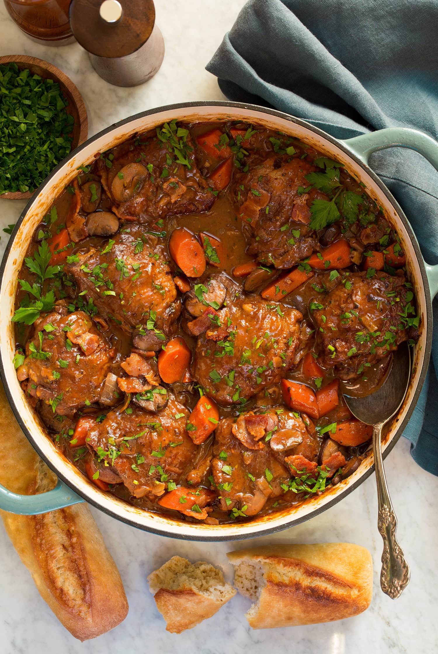 French style coq au vin shown from overhead in a pot.