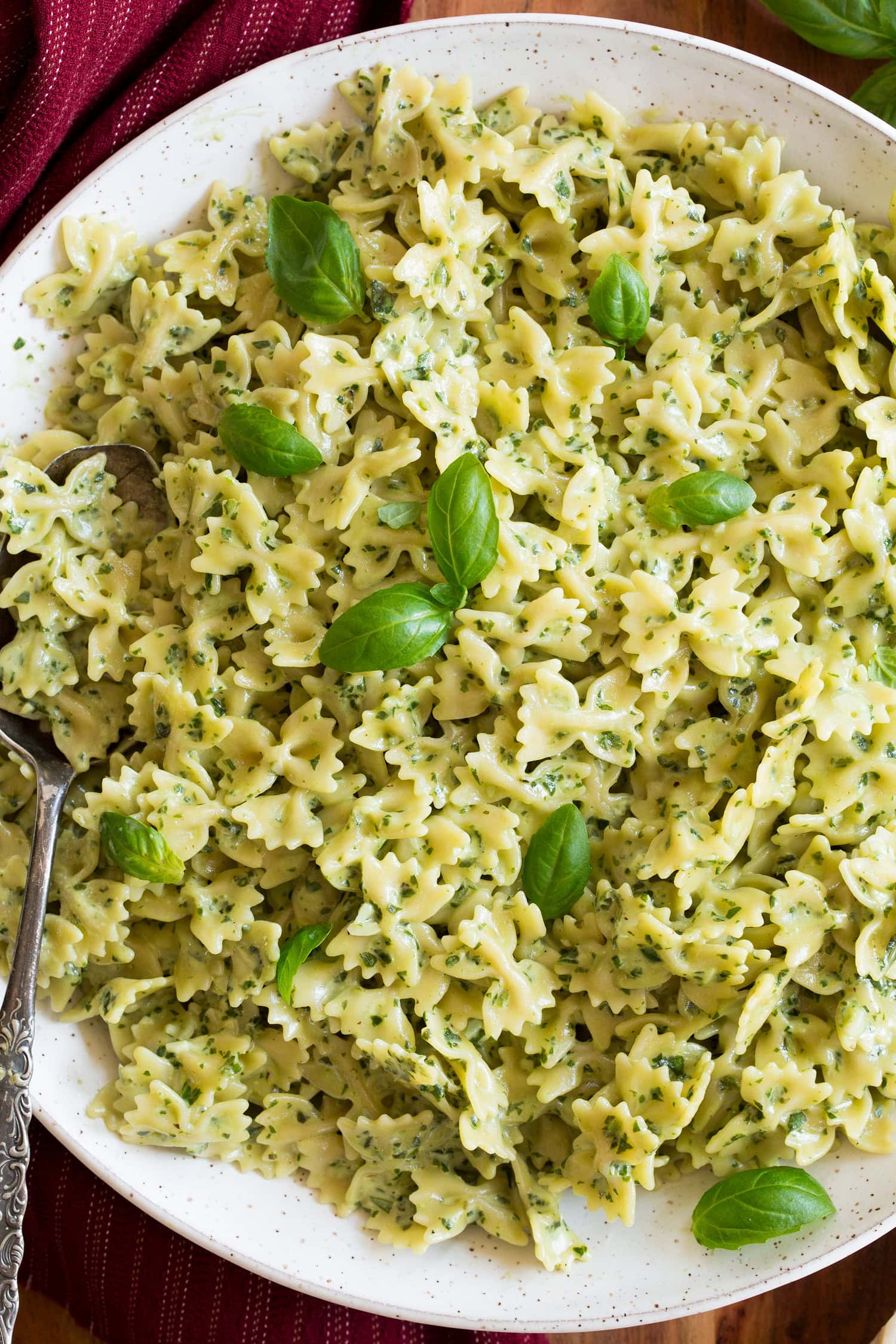 Close up photo of creamy pesto pasta.