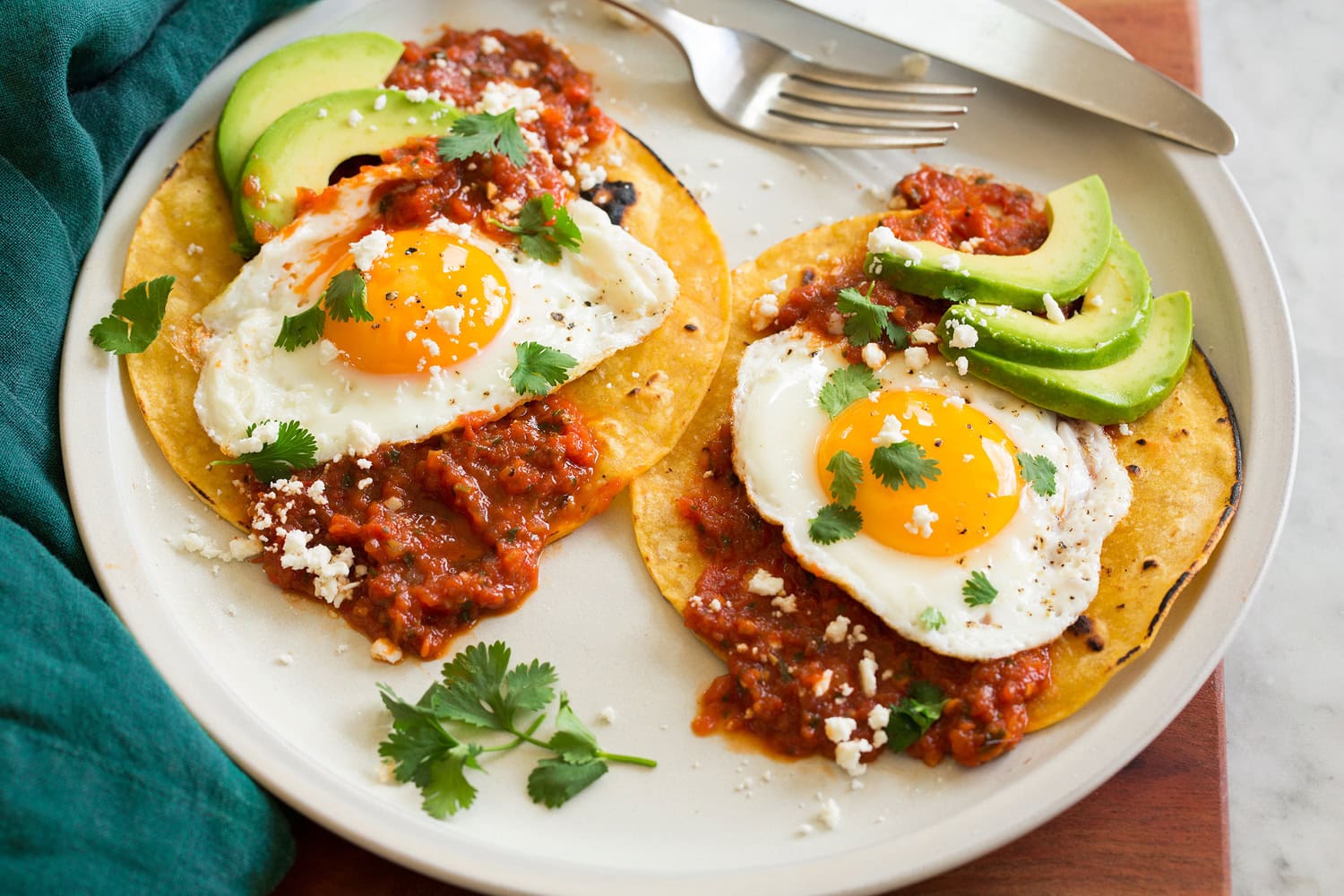 Assembled huevos rancheros shown.