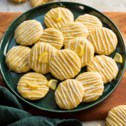 Plate of lemon cookies with icing.