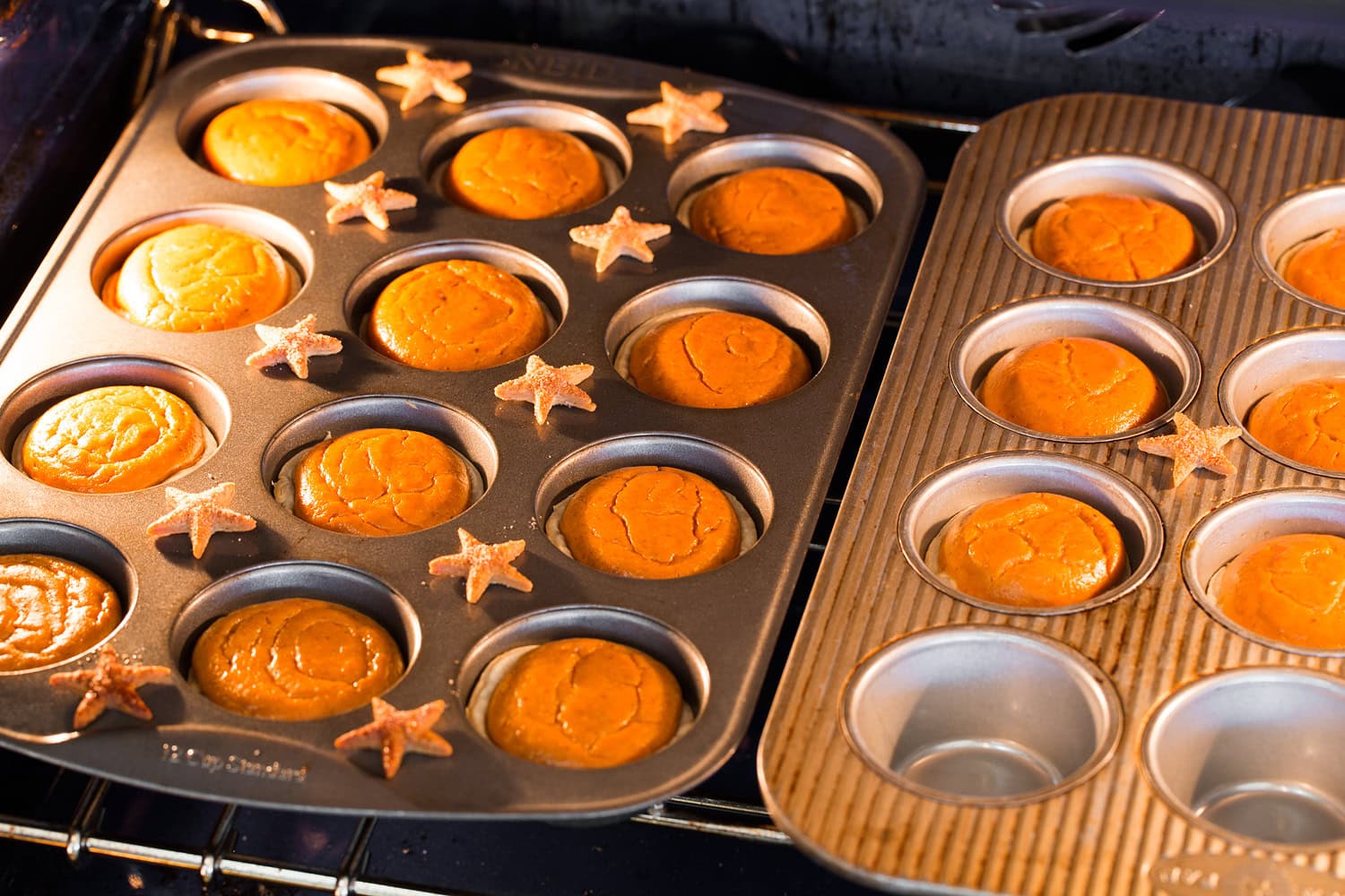 Mini pumpkin pies being baked in the oven.