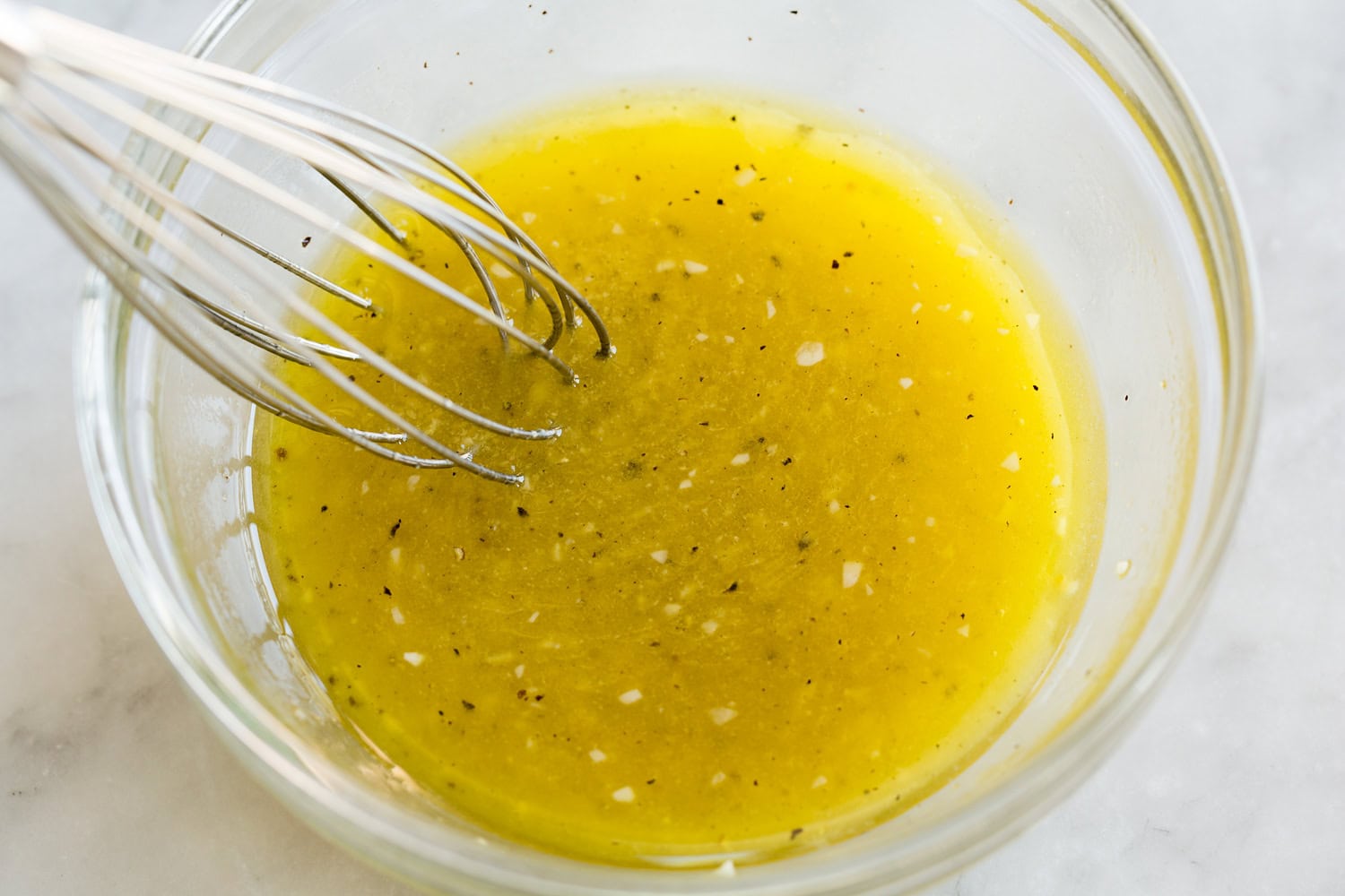 Mixed olive oil dressing mixture.