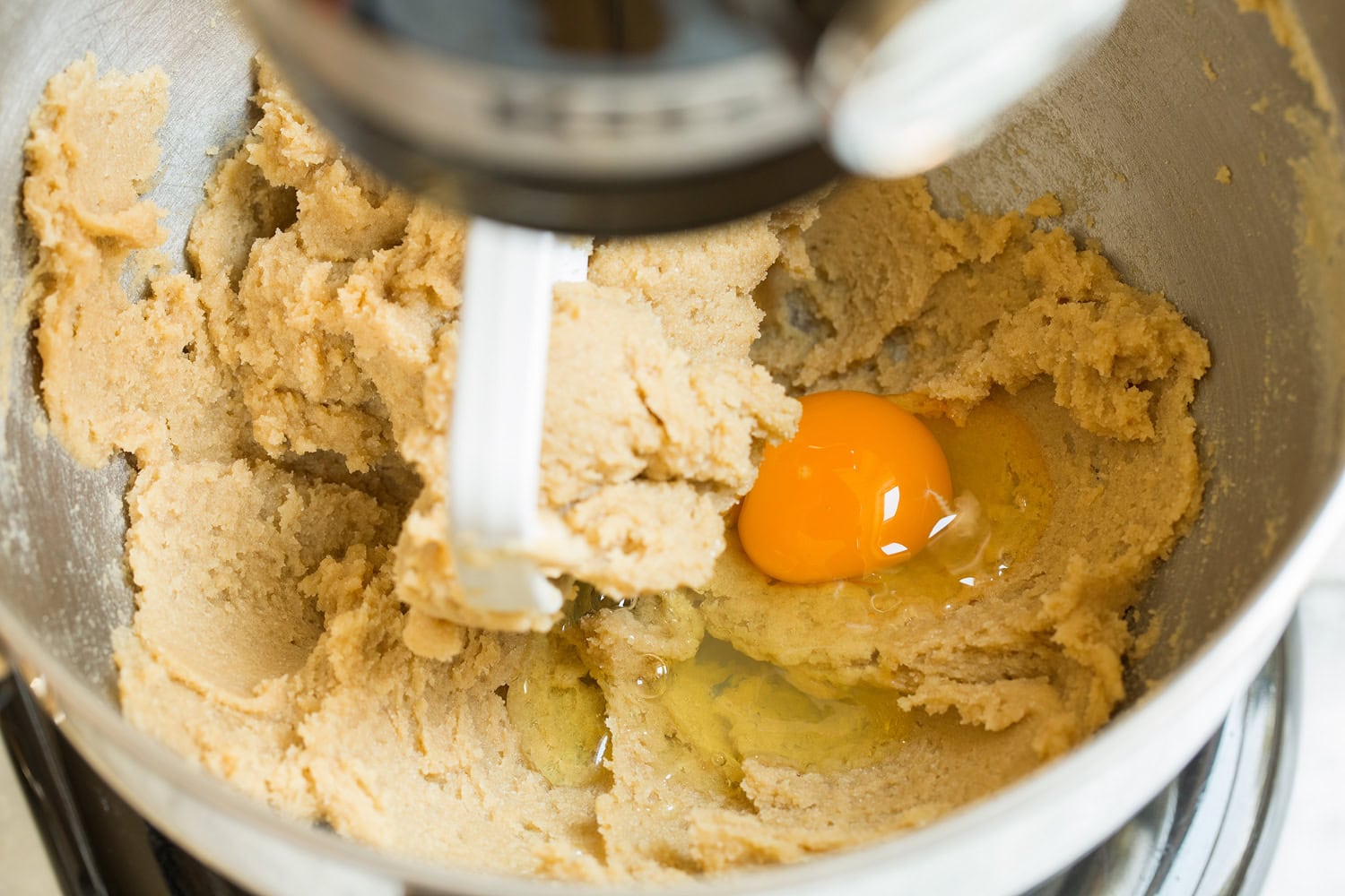 Egg added to butter sugar mixture.