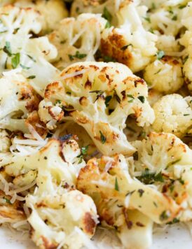 Roasted Cauliflower - this is one of best ways to upgrade mildly flavored fresh cauliflower. This simple method (along with some tasty seasonings) is sure to be one of your favorite ways to cook it!