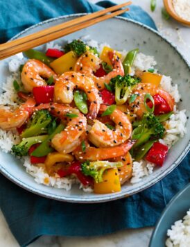 Shrimp stir fry with vegetables and rice.