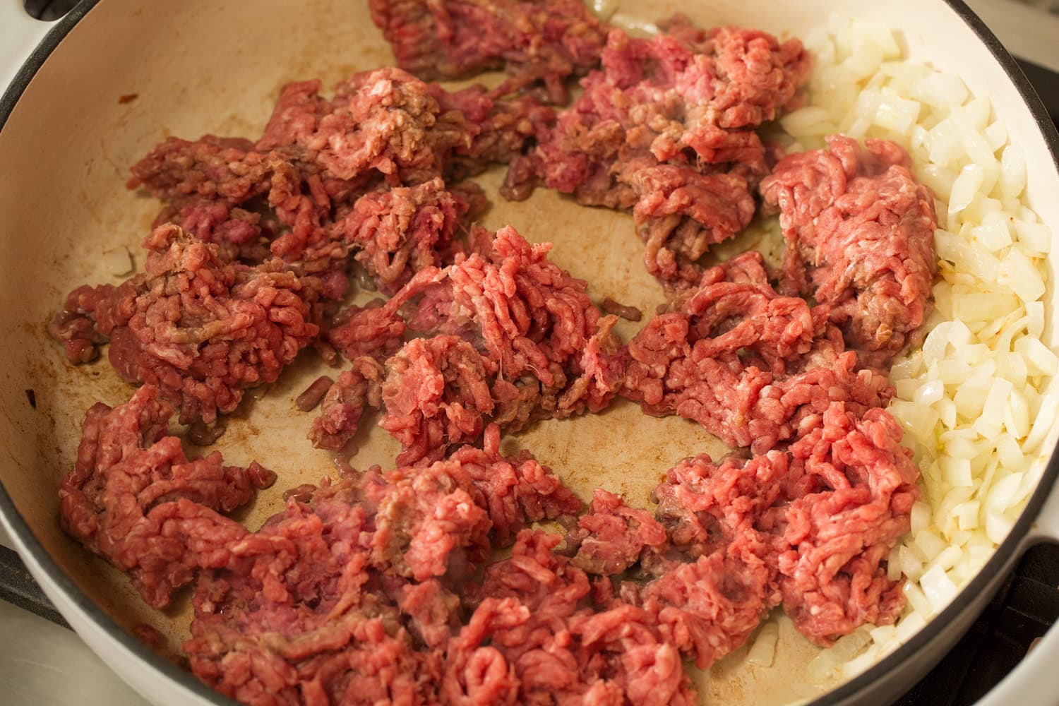 Browning beef in skillet.